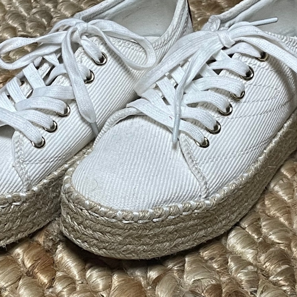 White Tretorn espadrille sneakers.